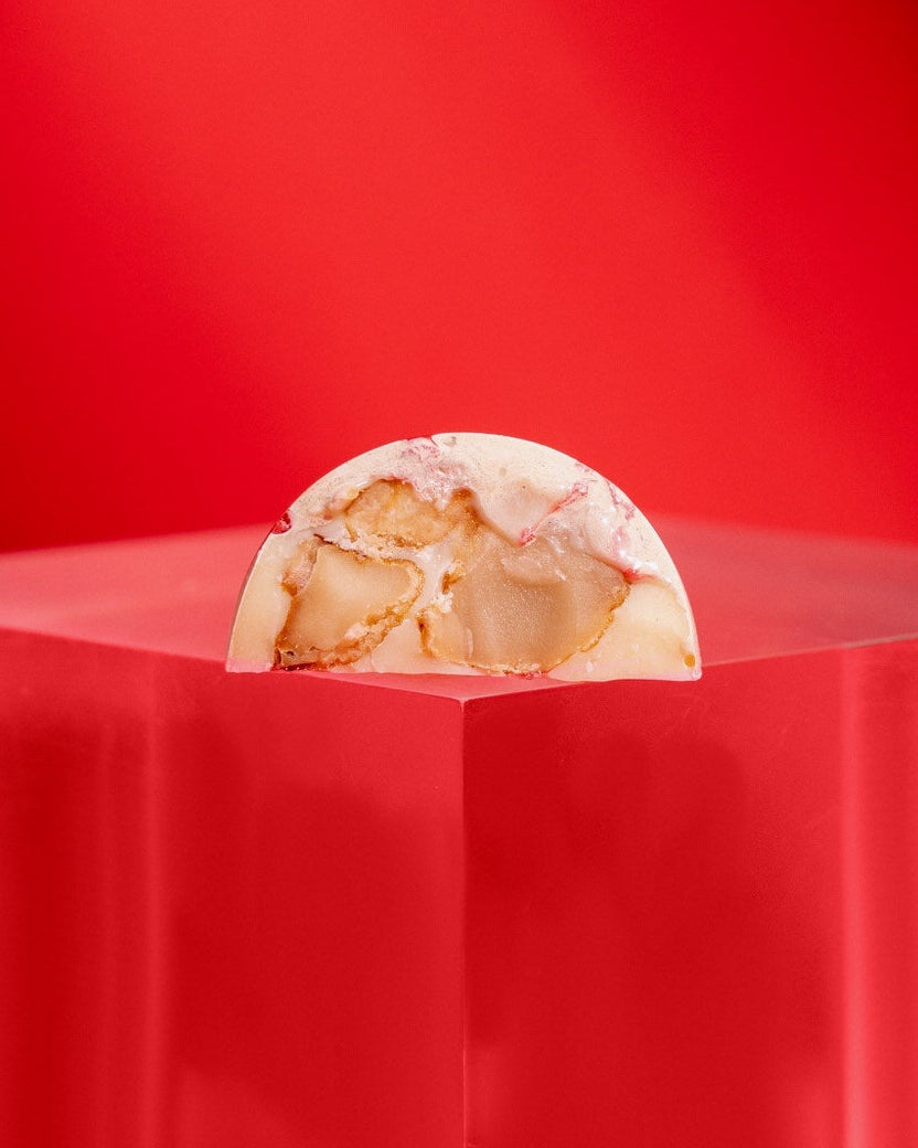 Chocolate blanco con macadamias caramelizadas